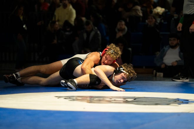 Dec 20, 2024; Wayne, NJ, USA; Clifton wrestling at Passaic Tech. (Left) Clifton’s Joseph Geleta and Passaic Tech’s Nicholas Maldonado in their 165 pound match.