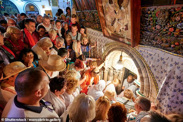 The town of Bethlehem in the Palestinian West Bank is now a hub for pilgrims who flock to the Grotto of the Nativity (pictured), believed to be the birthplace of Jesus