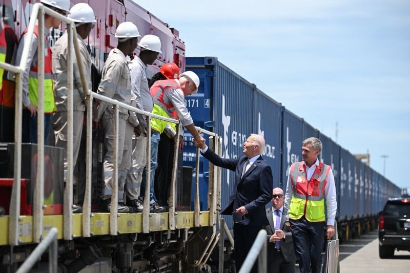 U.S. President Joe Biden meets employees of the Lobito Atlantic Railway at the Port of Lobito in Lobito, Angola, on Dec. 4.