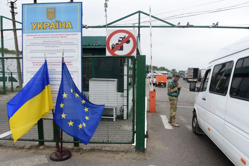 A white van crosses the Shehyni-Medyka checkpoint between Ukraine and Poland.