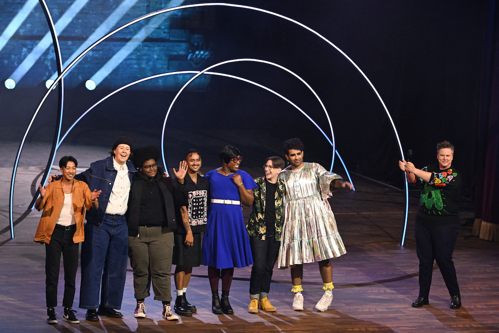 Hannah Gadsby’s Gender Agenda. (L to R) Jes Tom, Chloe Petts, Asha Ward, Krishna Istha, Mx. Dahlia Belle, DeAnne Smith, ALOK, Hannah Gadsby at the Alexandra Palace in London. Cr. Matt Crossick/Netflix © 2024