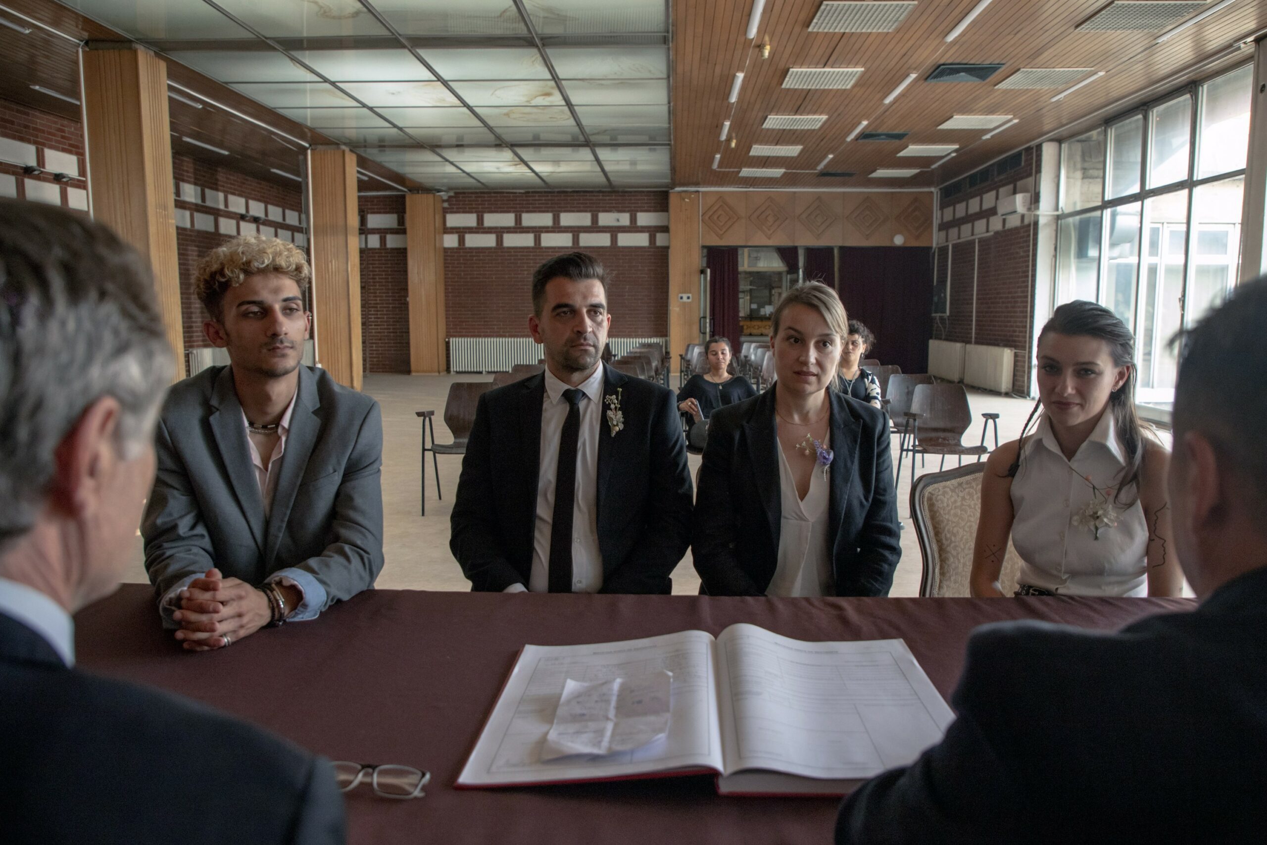 HOUSEKEEPING FOR BEGINNERS, (aka DOMAKINSTVO ZA POCETNICI), from left: Samson Selim, Vladimir Tintor, Anamaria Marinca, Sara Klimoska, 2023. ph: Viktor Irvin Ivanov / © Focus Features /Courtesy Everett Collection