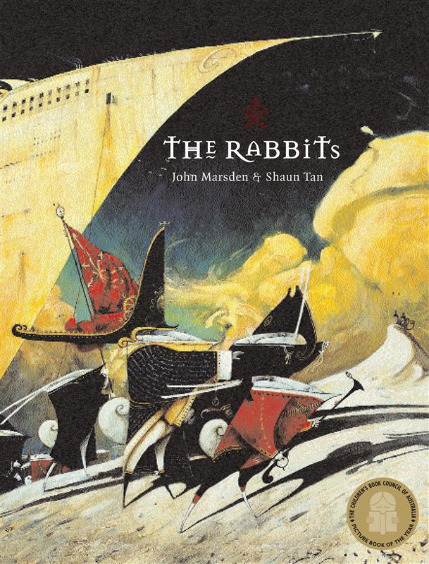 Cover of The Rabbits with different coloured shapes flying through the sky near a cloth ship's sail.