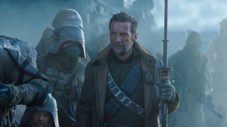 Mathieu Kassovitz' General Strix holding a staff on Star Wars: Skeleton Crew