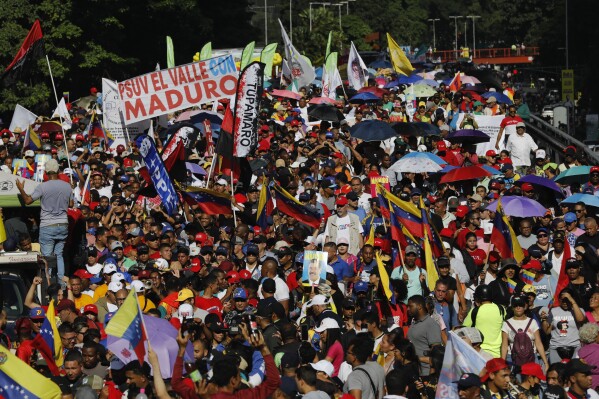 Pro-government supporters rally for Venezuelan President Nicolas Maduro, in Caracas, Venezuela, Aug. 17, 2024. (AP Photo/Cristian Hernandez, File)