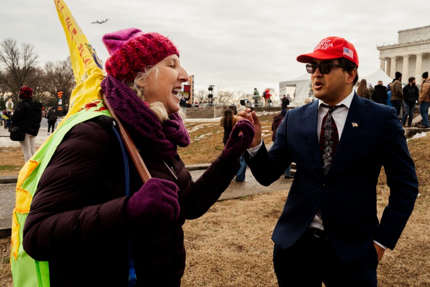 Jennifer Johnson, 59, of Chapel Hill, N.C., attempts to debate with a 31-year-old Donald Trump supporter from Riverside, Calif., who declined to give his name as thousands gather to protest Trump’s inauguration as the 47th president of the United States and other related issues during the People’s March on Saturday, Jan. 18, 2025, in Washington D.C.“Trump is a wrecking ball to the corporate establishment,” he said.