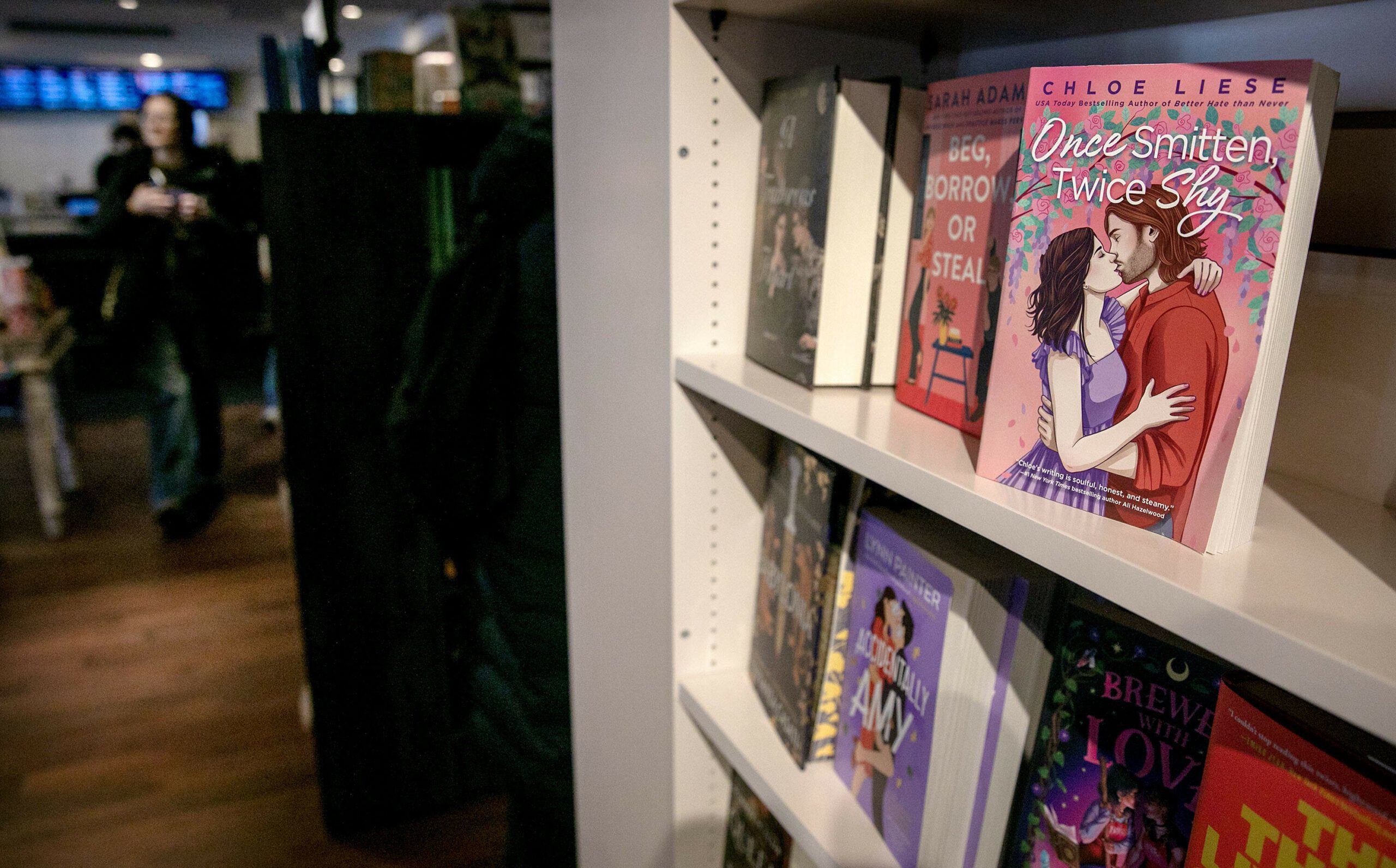 Romance books line the shelves. (Robin Lubbock/WBUR)