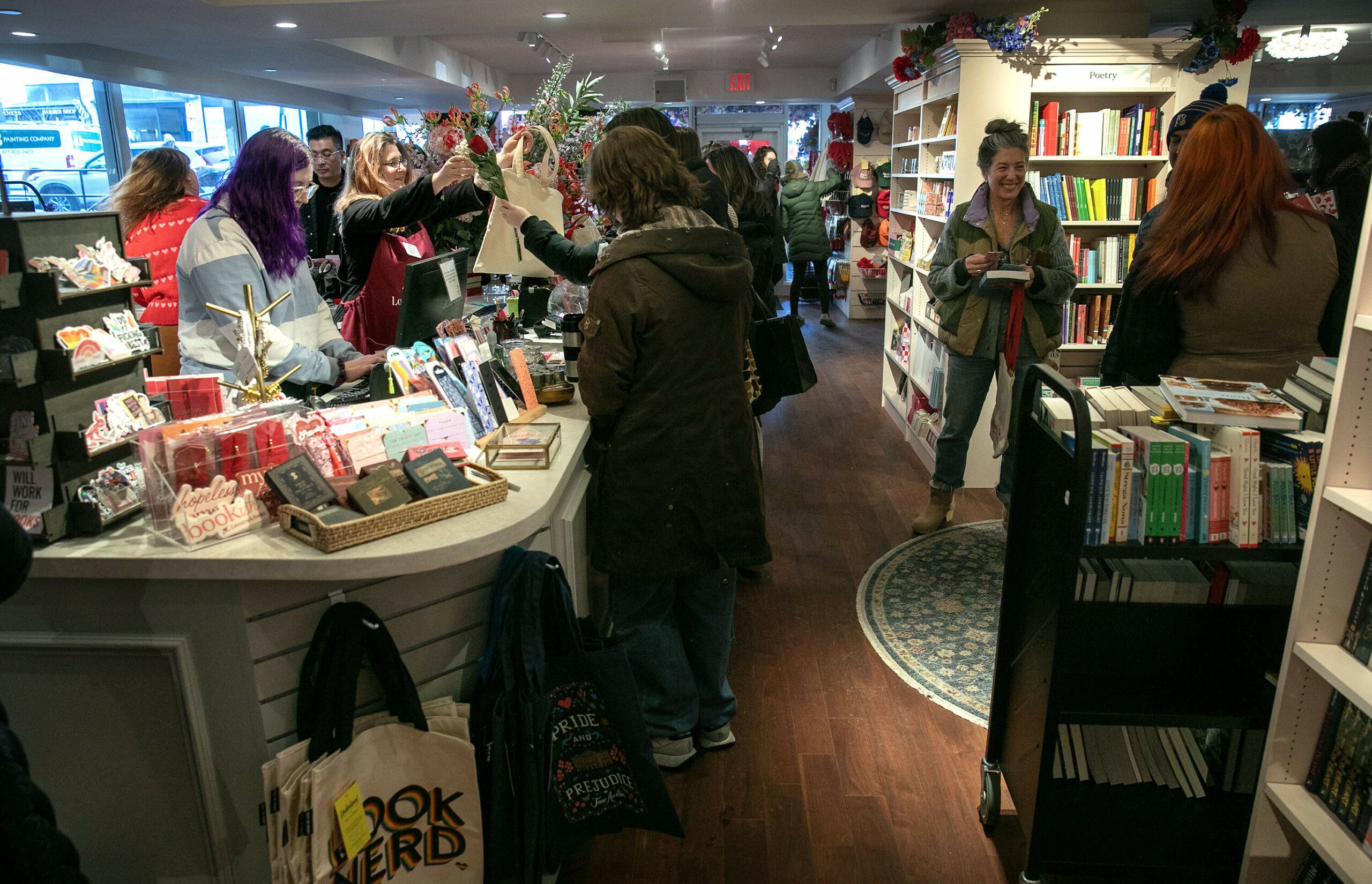 Shoppers check out at Lovestruck Books in Cambridge, Mass. (Robin Lubbock/WBUR)