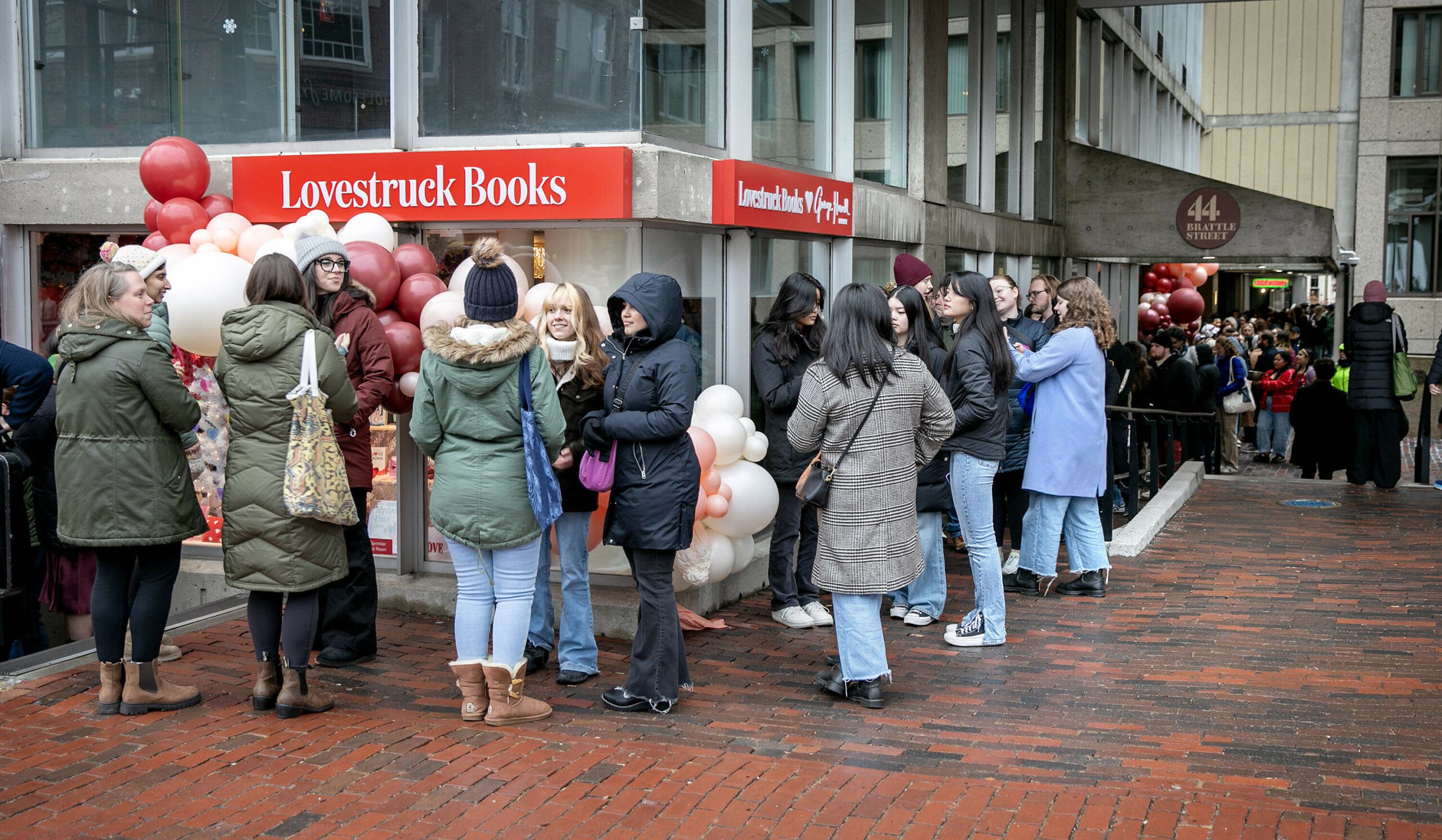 Customers line up around Lovestruck Books on opening day. (Robin Lubbock/WBUR)