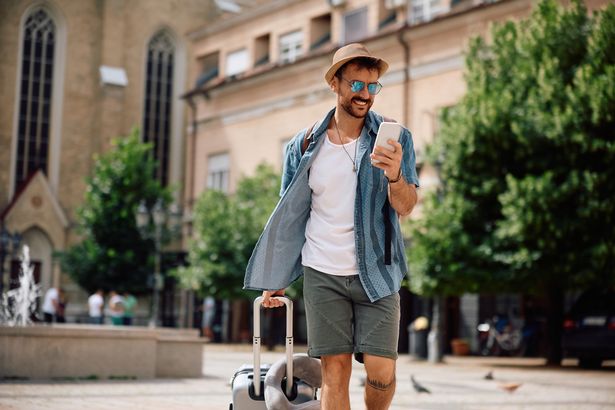 Man with phone in hand