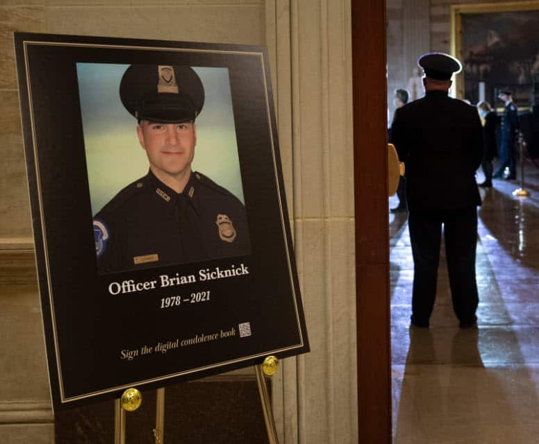 An image of the late US Capitol Police officer Brian Sicknick is on display at the US Capitol in Washington DC, 2 February, 2021.