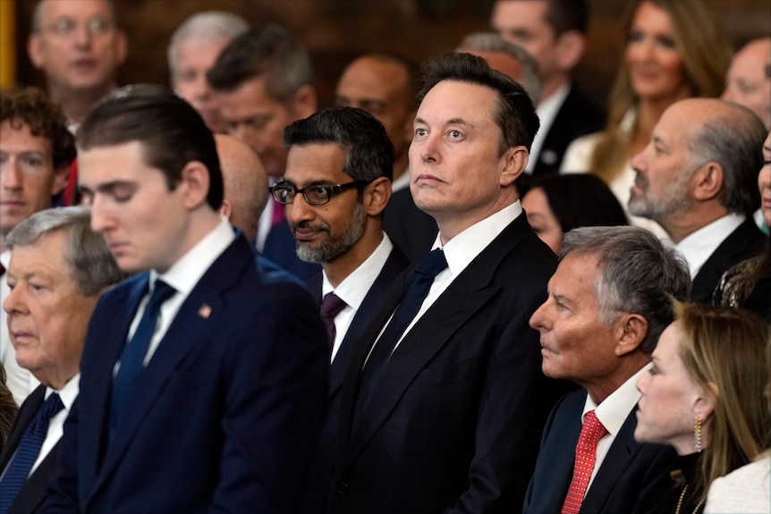 Google CEO Sundar Pichai and Elon Musk watch Donald Trump's Presidential Inauguration.