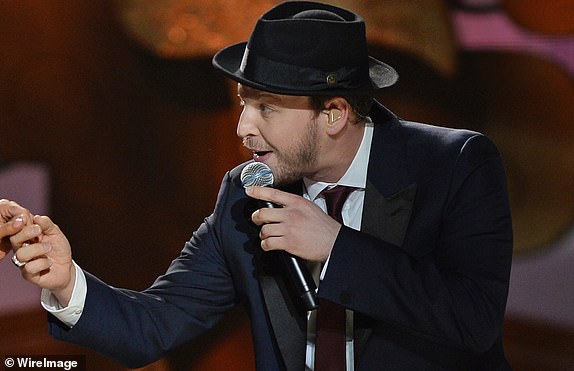 MIAMI, FL - JANUARY 25: Gavin DeGraw and Miss USA Nia Sanchez onstage during The 63rd Annual Miss Universe Pageant at Florida International University on January 25, 2015 in Miami, Florida. (Photo by Larry Marano/WireImage)