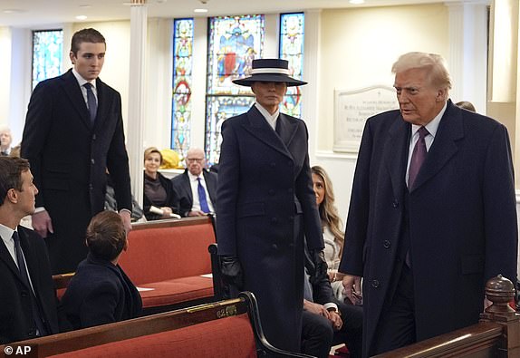 President-elect Donald Trump, Melania Trump and Barron Trump arrive for a service at St. John's Church, Monday, Jan. 20, 2025, in Washington, ahead of the 60th Presidential Inauguration. (AP Photo/Evan Vucci)