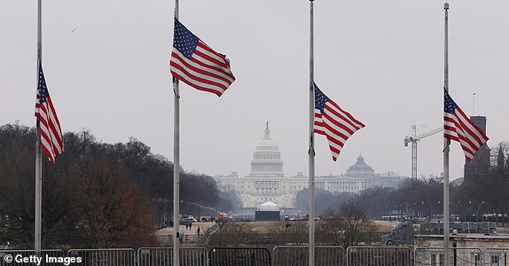 WASHINGTON, DC - JANUARY 19:  The U.S. Capitol is shown from the Washington Monument as American flags fly at half-staff, for passing of former President Jimmy Carter, January 19, 2025 in Washington, DC. U.S. President-elect Donald Trump and Vice President-elect JD Vance  will be sworn in on January 20. (Photo by Samuel Corum/Getty Images)