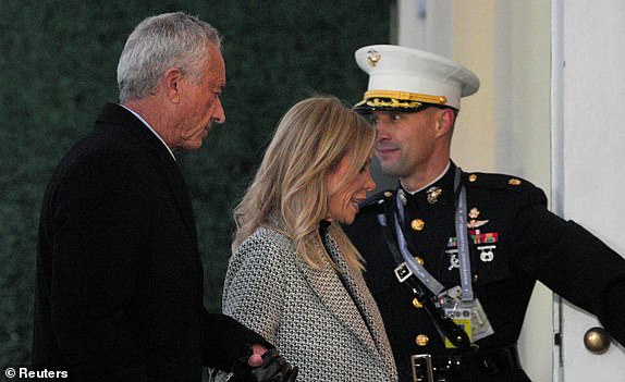 U.S. President-elect Donald Trump's nominee to be U.S. Secretary of Health and Human Services Robert F. Kennedy Jr. and his wife Cheryl Hines arrive for a service at St. John's Church on Inauguration Day of Donald Trump's second presidential term in Washington, U.S. January 20, 2025. REUTERS/Jeenah Moon