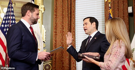 Marco Rubio is sworn in as Secretary of State by U.S. Vice President JD Vance at the Eisenhower Executive Office Building in Washington, U.S., January 21, 2025.  REUTERS/Kevin Lamarque