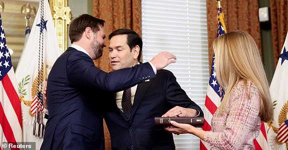 Marco Rubio reacts as he is sworn in as Secretary of State by U.S. Vice President JD Vance at the Eisenhower Executive Office Building in Washington, U.S., January 21, 2025.  REUTERS/Kevin Lamarque