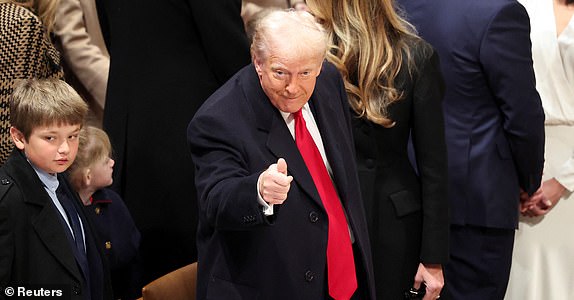 U.S. President Donald Trump gives a thumbs up as he attends the National Day of Prayer Service at the Washington National Cathedral in Washington, U.S., January 21, 2025.  REUTERS/Kevin Lamarque      TPX IMAGES OF THE DAY