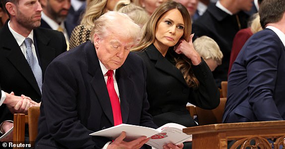 U.S. President Donald Trump and first lady Melania attend the National Day of Prayer Service at the Washington National Cathedral in Washington, U.S., January 21, 2025.  REUTERS/Kevin Lamarque      TPX IMAGES OF THE DAY