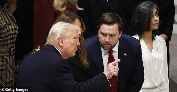 WASHINGTON, DC - JANUARY 21: (L-R) U.S. President Donald Trump gestures as first lady Melania Trump, U.S. Vice President J.D. Vance and second lady Usha Vance attend the National Prayer Service at Washington National Cathedral on January 21, 2025 in Washington, DC. Tuesday marks Trump's first full day of his second term in the White House. (Photo by Chip Somodevilla/Getty Images)