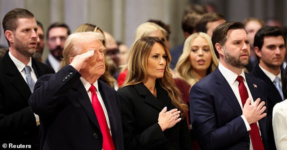 U.S. President Donald Trump, first lady Melania and U.S. Vice President J.D. Vance attend the National Day of Prayer Service at the Washington National Cathedral in Washington, U.S., January 21, 2025.  REUTERS/Kevin Lamarque