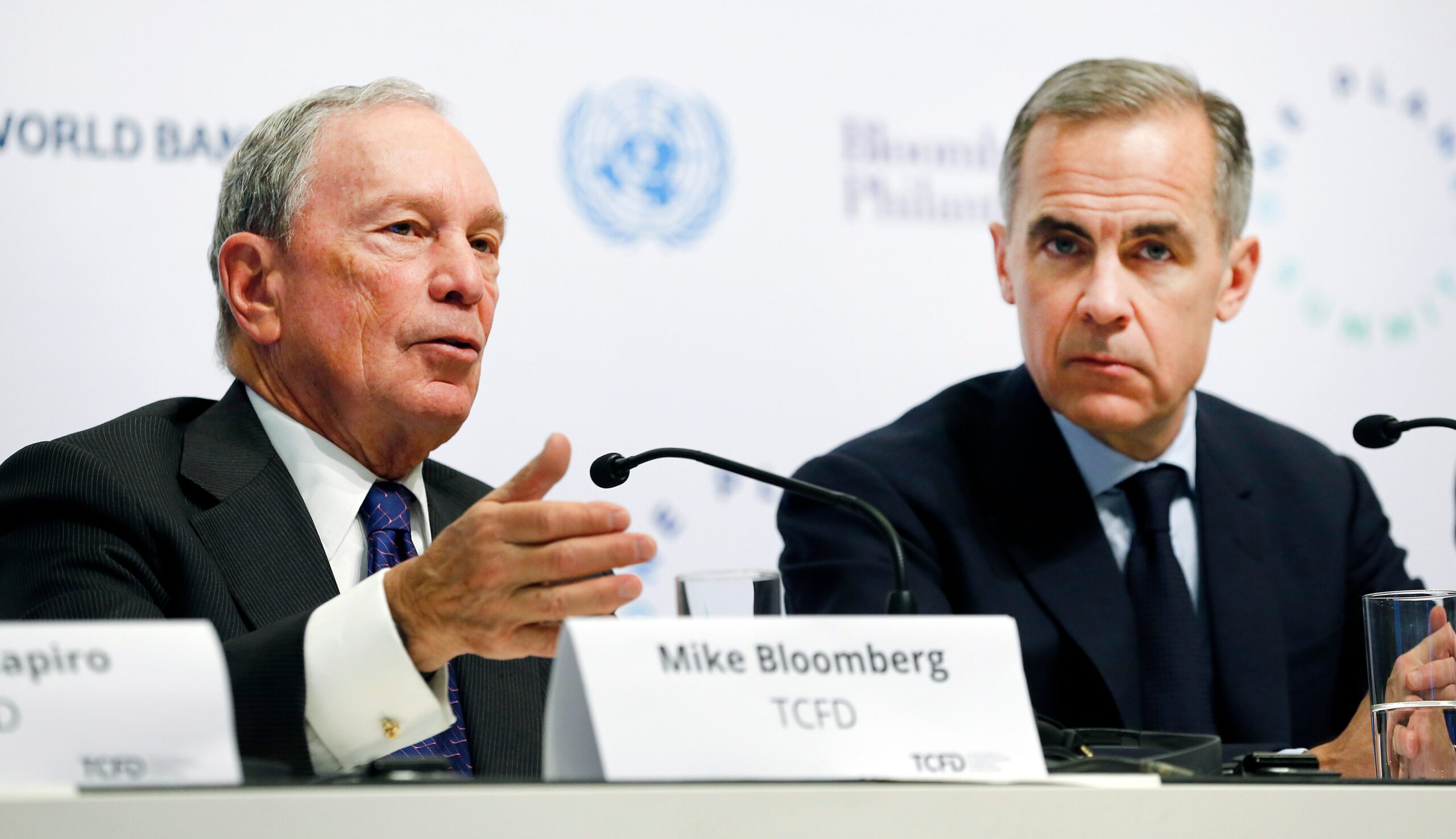 Michael Bloomberg and Mark Carney at a press conference during the One Planet Summit.