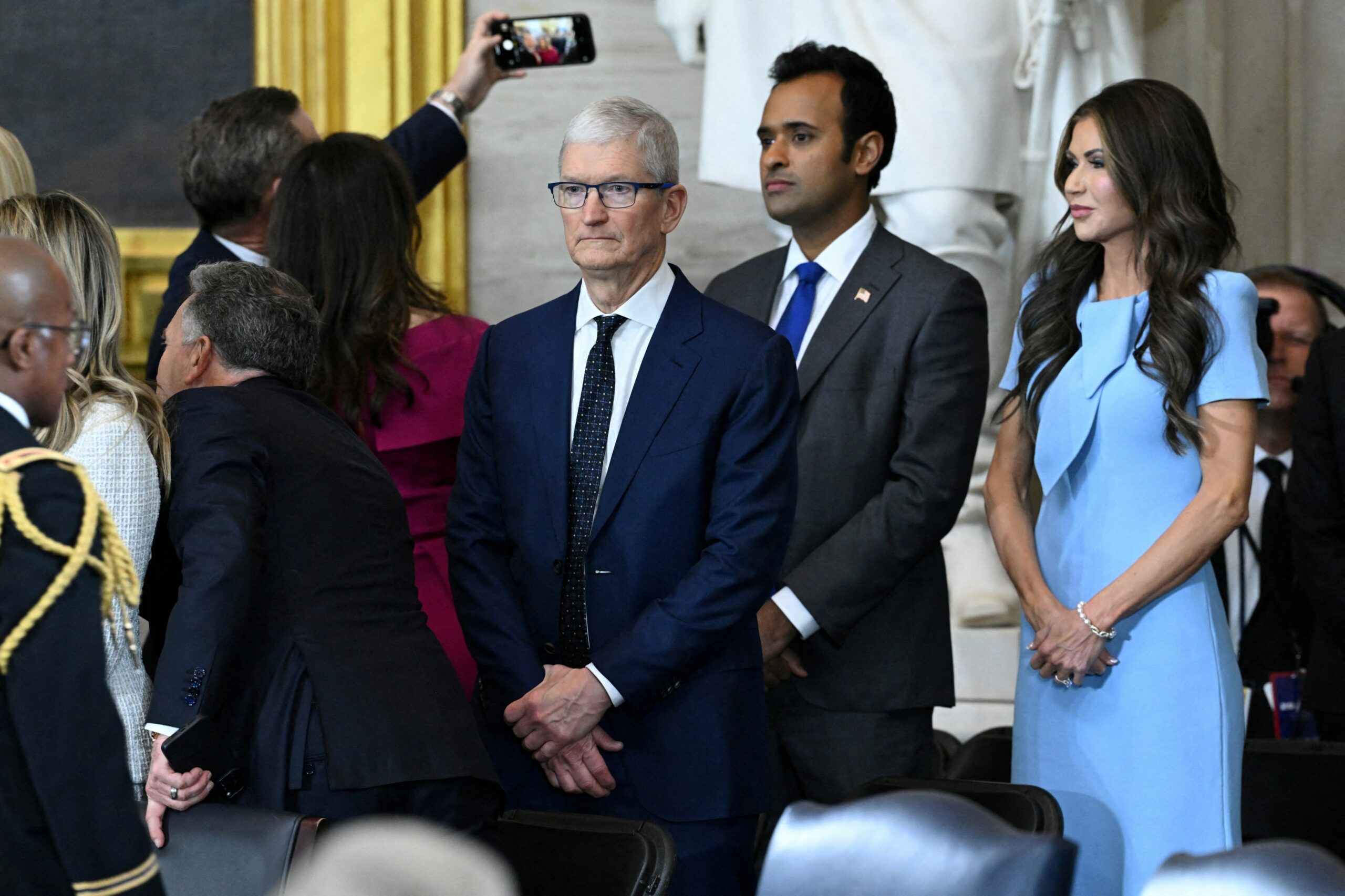 Tim Cook, Vivek Ramaswamy, and Kristi Noem at Trump's presidential inauguration.