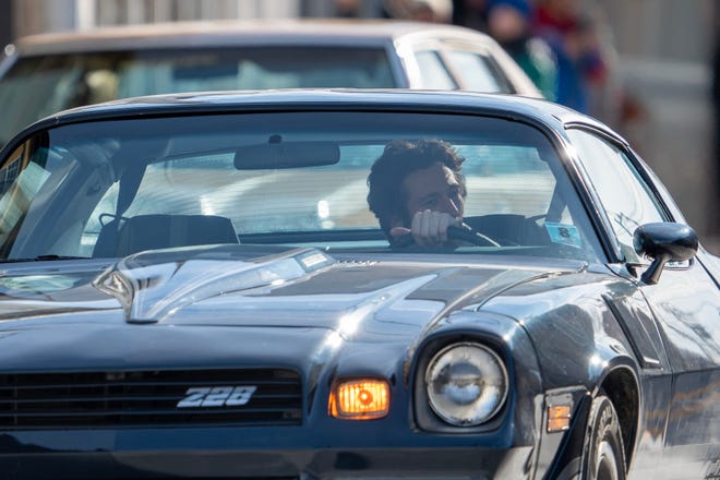 Jeremy Allen White drives a Z28 Camaro during the filming of a scene for the Bruce Springsteen movie Deliver Me from Nowhere in Freehold, NJ Friday, January 10, 2025. Both Jeremy Allen White and Bruce Springsteen were on set.