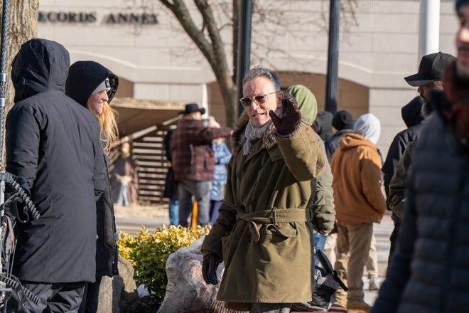 Bruce Springsteen waves to a crowd of fans during the filming of the Bruce Springsteen movie Deliver Me from Nowhere in Freehold, NJ Friday, January 10, 2025. Both Jeremy Allen White and Bruce Springsteen were on set.