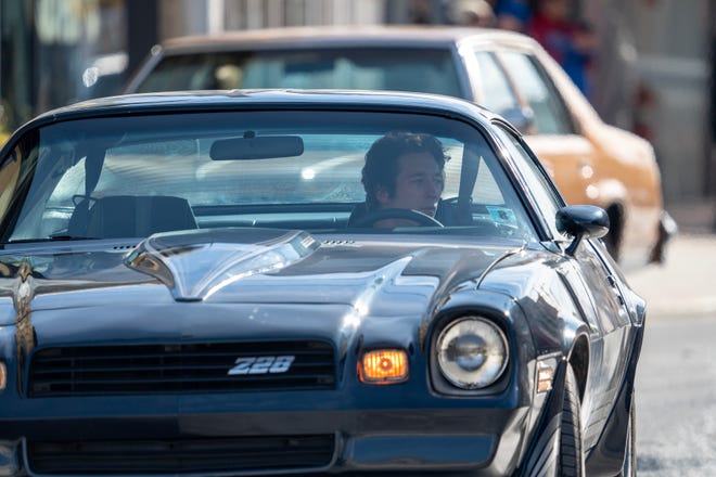 Jeremy Allen White drives a Z28 Camaro during the filming of a scene for the Bruce Springsteen movie Deliver Me from Nowhere in Freehold, NJ Friday, January 10, 2025. Both Jeremy Allen White and Bruce Springsteen were on set.