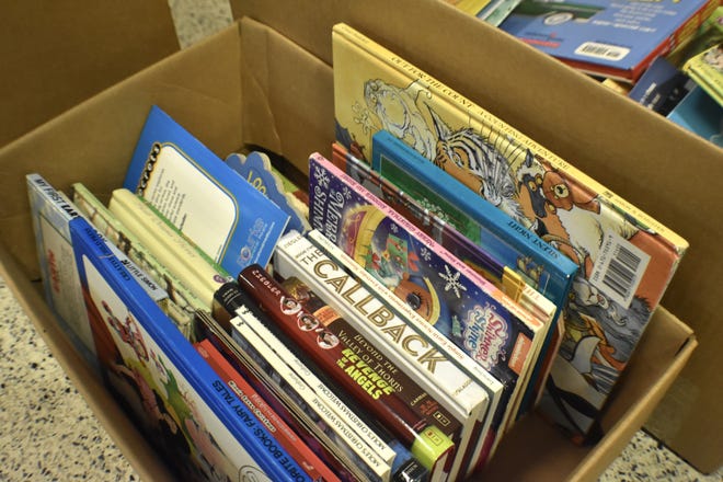 A variety of books were collected from Kohler Elementary School classrooms, as seen, Friday, January 17, in Kohler, Wis.