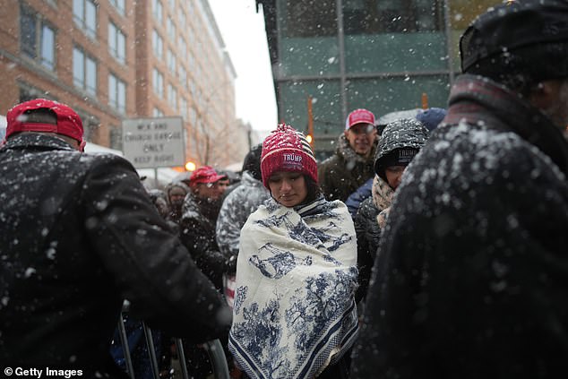 Supporters gathered outside in the snow and freezing cold for a chance to celebrate Trump's victory