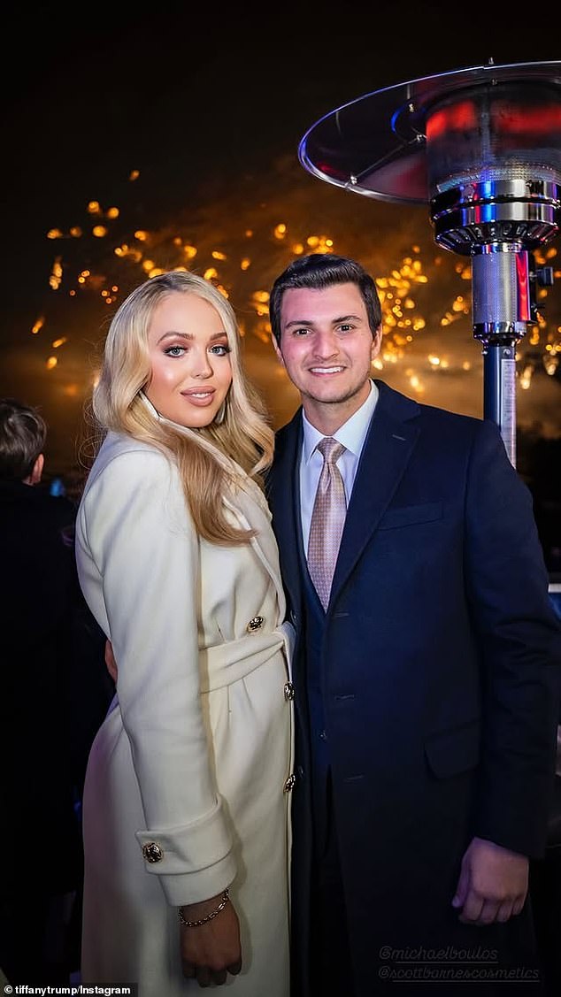 Tiffany and her husband Michael Boulos posed in front of glittering fireworks