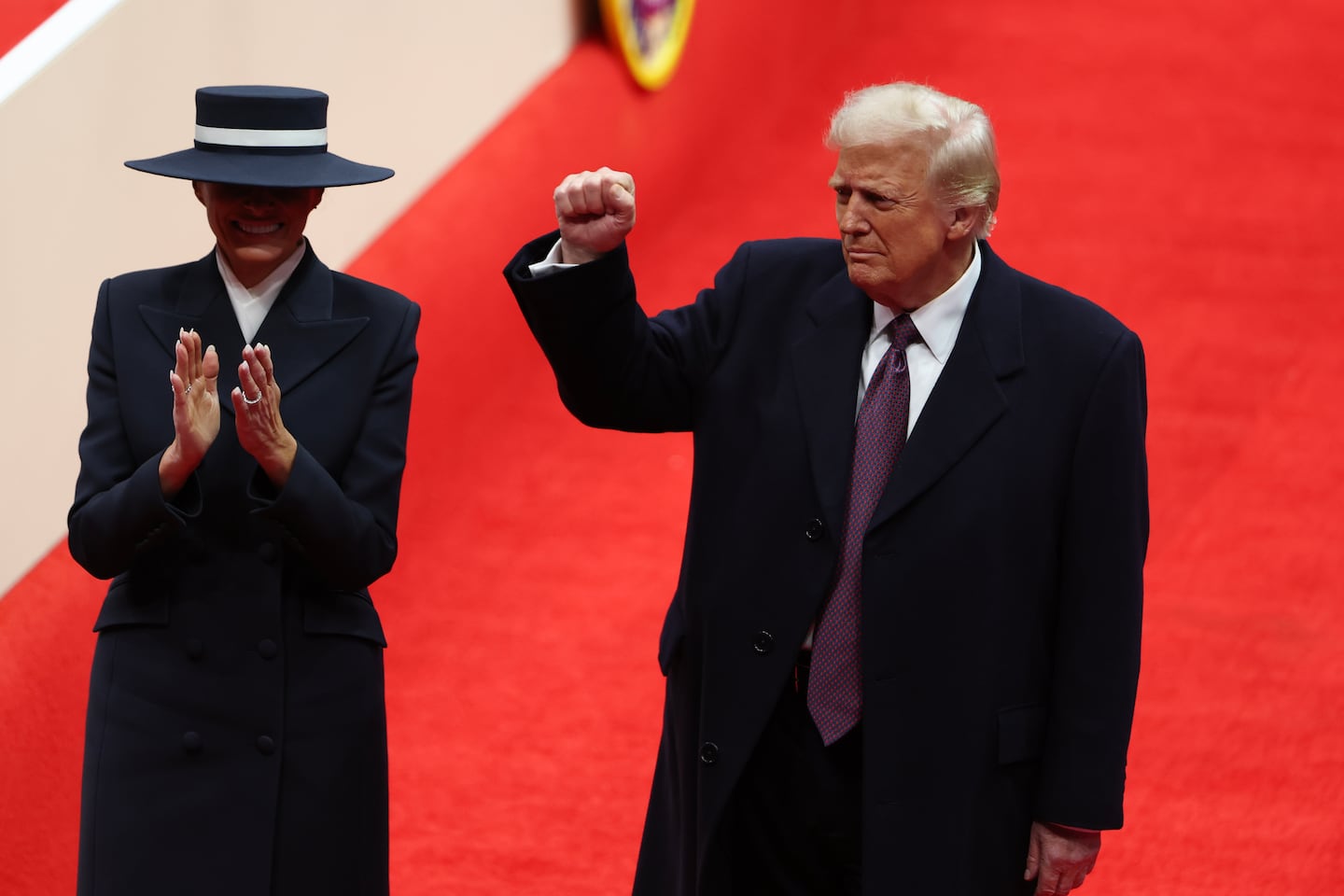 First lady Melania Trump and President Donald Trump arrive during an indoor inauguration parade at the Capital One Arena on Jan. 20, 2025 in Washington, D.C. 