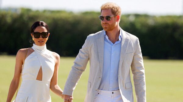 Britain's Prince Harry and Meghan, Duchess of Sussex attend the Royal Salute Polo Challenge to benefit Sentebale, a charity founded by him and Prince Seeiso of Lesotho to support children in Lesotho and Botswana, in Wellington, Florida, U.S., April 12, 2024.