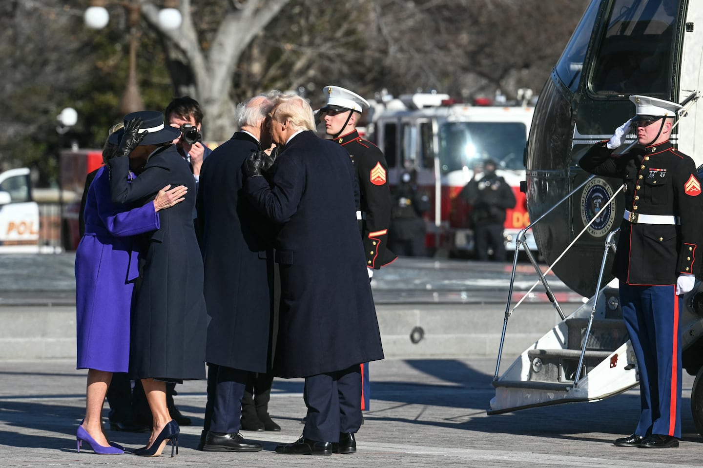 President Donald Trump and First Lady Melania Trump participate in a departure ceremony for former President Joe Biden and former First Lady Jill Biden, before the Bidens board a helicopter outside the US Capitol in Washington, D.C., on Jan. 20, 2025. 