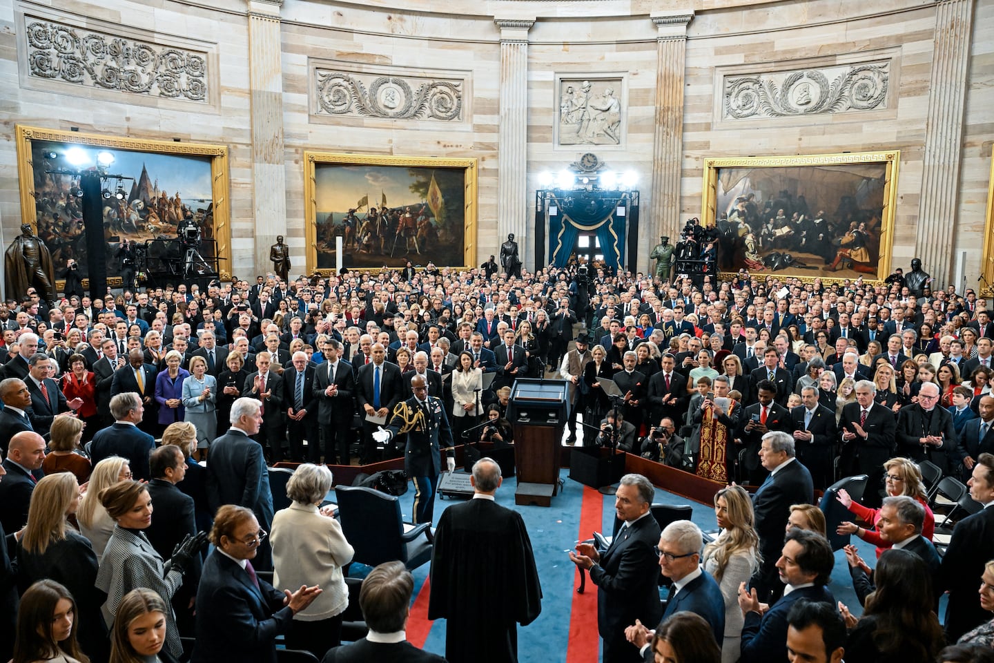 Supreme Court Chief Justice John Roberts, center, arrives before the inauguration of Donald Trump as the 47th president in the Rotunda at the Capitol in Washington on Monday morning, Jan. 20, 2025. 