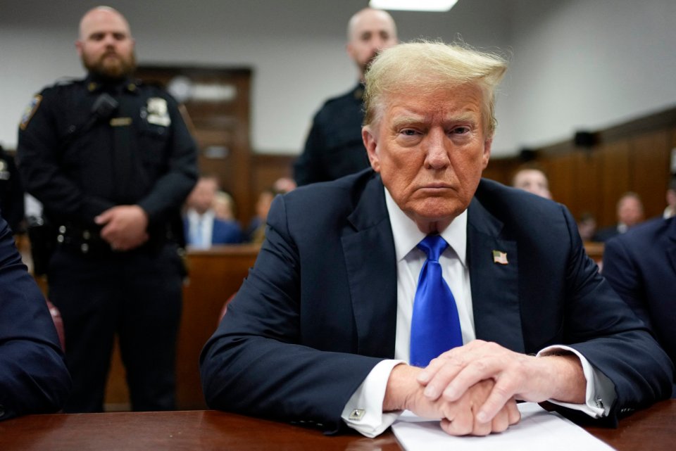 Donald Trump seated at the defense table during his criminal trial at Manhattan Criminal Court on May 30, 2024