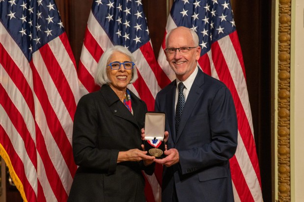 Arati Prabhkakar, Ph.D., Director of the White House House Office of Science and Technology Policy, awards Paul Yock the National Medal of Technology and Innovation at the Eisenhower Executive Office Building in Washington D.C.