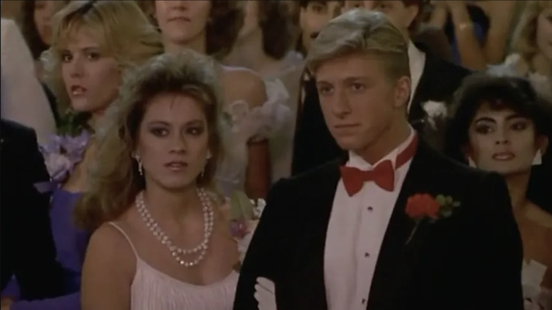 Denise and Greg in the audience at prom in Just One of the Guys