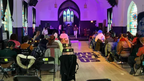 Mike Wendling/BBC News Congregants in the interior of Chicago's Lincoln United Methodist Church. 