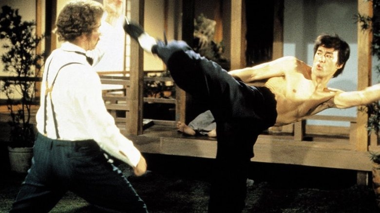 Bruce Lee's Zhen kicking Robert Baker's Petrov in Fist of Fury