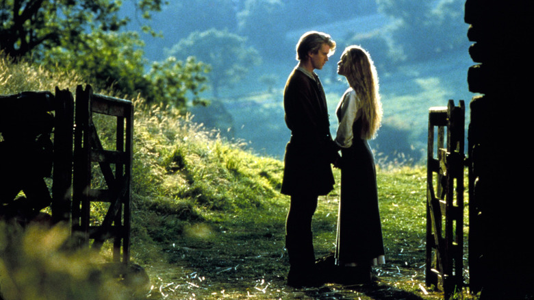 Princess Buttercup (Robin Wright) and Westley (Cary Elwes) holding hands in The Princess Bride