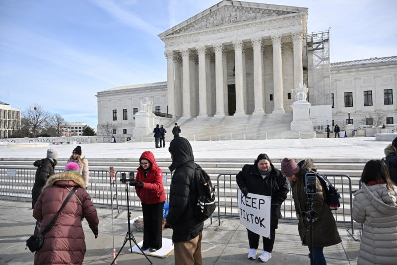 Supporters of TikTok livestream in front of the U.S. Supreme Court in Washington on Jan. 10.