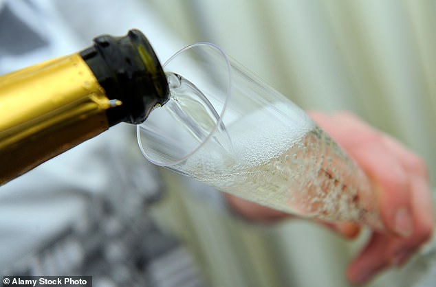The angle at which the champagne is poured into the glass is important, too (stock image)