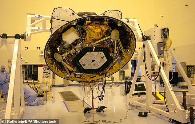 The Phoenix Mars Lander in the cleanroom at the Kennedy Space Center. This photograph was taken in 2007, when bacterial samples were collected from the floor
