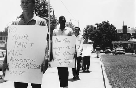 people holding signs
