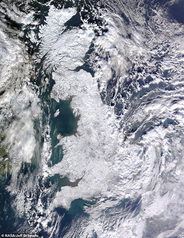 Temperatures could plummet by 6°C (10.8°F) by 2100 as global ocean currents collapse. This remarkable satellite picture showing the extent of snow across Britain on January 7, 2010 gives an idea of what this could be like