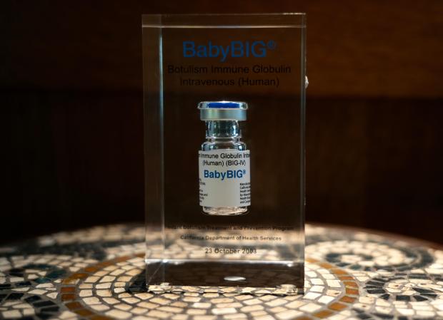 A glass case displaying a vial of BabyBIG, the treatment for infant botulism is shown on Nov. 21, 2025 in Aos Altos, Calif. (AP Photo/Terry Chea)